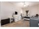 Bright, airy bedroom with large windows and neutral color palette at 1145 E Harold Dr, San Tan Valley, AZ 85140