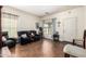 View of a living room showcasing tile flooring and neutral-colored walls at 1145 E Harold Dr, San Tan Valley, AZ 85140
