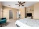Main bedroom featuring access to a bathroom and walk-in closet at 1145 E Harold Dr, San Tan Valley, AZ 85140