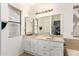 Bathroom with double sinks and large mirror at 11524 W Rosewood Dr, Avondale, AZ 85392