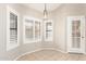 A sunny breakfast nook with white shuttered windows at 11524 W Rosewood Dr, Avondale, AZ 85392