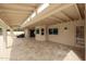 A covered patio provides a comfortable space for outdoor entertainment, overlooking the pool at 12448 N 76Th St, Scottsdale, AZ 85260