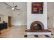 Spacious living room with brick fireplace, perfect for entertaining or relaxing in style at 12448 N 76Th St, Scottsdale, AZ 85260