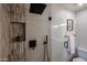 Modern shower design with sleek fixtures and a built-in niche at 12448 N 76Th St, Scottsdale, AZ 85260
