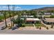 Aerial view of home featuring desert landscaping, mountains in the background, and a lush green lawn at 12835 N 16Th Dr, Phoenix, AZ 85029