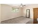 Comfortable carpeted bedroom with a window at 12835 N 16Th Dr, Phoenix, AZ 85029