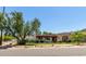 Charming single-story home with a red tile roof and inviting front yard landscaping at 12835 N 16Th Dr, Phoenix, AZ 85029