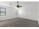 Large bedroom with neutral carpet and plenty of natural light at 12950 W Alegre Dr, Litchfield Park, AZ 85340