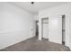 Well-lit bedroom with closet, fresh carpet, and neutral paint at 12950 W Alegre Dr, Litchfield Park, AZ 85340