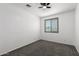 Comfortable bedroom filled with natural light and neutral carpeting at 12950 W Alegre Dr, Litchfield Park, AZ 85340