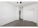 Bright bedroom with ceiling fan and closet space at 12950 W Alegre Dr, Litchfield Park, AZ 85340