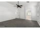 Spacious main bedroom featuring neutral color palette and ceiling fan at 12950 W Alegre Dr, Litchfield Park, AZ 85340