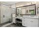 Bathroom with a large vanity, granite countertops, and a walk-in shower at 13252 W Steed Ridge Rd, Peoria, AZ 85383