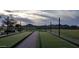Scenic bocce ball court beneath string lights, surrounded by desert landscaping and mountain views at 13252 W Steed Ridge Rd, Peoria, AZ 85383