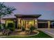 Charming single-story home with desert landscaping and a cozy covered front porch at 13252 W Steed Ridge Rd, Peoria, AZ 85383