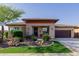 Well-maintained single-story home with desert landscaping and a charming front porch at 13252 W Steed Ridge Rd, Peoria, AZ 85383