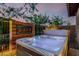 Inviting hot tub with colorful lighting, perfect for relaxation and enjoying the starlit evenings at 13252 W Steed Ridge Rd, Peoria, AZ 85383