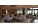 Spacious lobby area featuring stone accents, comfortable seating, and abundant natural light for relaxing and socializing at 13252 W Steed Ridge Rd, Peoria, AZ 85383
