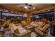 Expansive covered patio with comfortable seating, perfect for gatherings and enjoying the outdoor views at 13252 W Steed Ridge Rd, Peoria, AZ 85383
