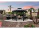 Outdoor gazebo with a cozy seating area, BBQ, well-manicured landscaping, creating an inviting entertainment space at 13634 W San Miguel Ave, Litchfield Park, AZ 85340