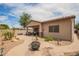 Expansive backyard featuring desert landscaping and brick pavers at 1410 W Popcorn Tree Ave, Queen Creek, AZ 85140