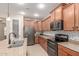 Well-equipped kitchen featuring stainless steel appliances, granite countertops, and a stylish backsplash design at 1410 W Popcorn Tree Ave, Queen Creek, AZ 85140