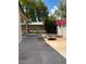 The backyard features a fire pit and a decorative block wall with red bougainvillea at 1616 W Temple St, Chandler, AZ 85224