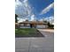Charming single-story home featuring a well-manicured lawn and a two-car garage at 1616 W Temple St, Chandler, AZ 85224