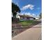 A charming single-story home with a large front lawn and a two-car garage at 1616 W Temple St, Chandler, AZ 85224