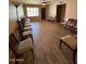 A spacious living room offers natural light and wood-look floors at 1616 W Temple St, Chandler, AZ 85224