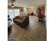 Bright living room with hardwood floors, natural light, and an open layout to the kitchen at 1616 W Temple St, Chandler, AZ 85224