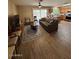 Open living room features hardwood floors, natural light, and an open layout to the kitchen at 1616 W Temple St, Chandler, AZ 85224