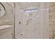 Modern bathroom with a large walk-in shower featuring beautiful tile work and stylish fixtures at 17421 N 14Th St, Phoenix, AZ 85022