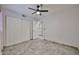 This bedroom features a ceiling fan, a closet with sliding doors, and neutral wall colors at 17421 N 14Th St, Phoenix, AZ 85022