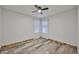 Bright bedroom featuring a ceiling fan, natural light from windows, and neutral walls at 17421 N 14Th St, Phoenix, AZ 85022