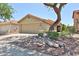 Well-maintained single-Gathering home with a two-car garage and attractive desert landscaping at 17421 N 14Th St, Phoenix, AZ 85022