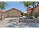 Charming single-story home featuring a two-car garage and meticulously landscaped front yard at 17421 N 14Th St, Phoenix, AZ 85022
