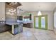 Stylish kitchen with sleek cabinets, modern lighting, and a functional island at 17421 N 14Th St, Phoenix, AZ 85022