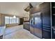Modern kitchen with stainless steel appliances, tiled floors, and ample countertop space for cooking at 17421 N 14Th St, Phoenix, AZ 85022