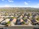 Aerial view of neighborhood featuring manicured lawns and beautiful mountain views at 1747 E Grove St, Phoenix, AZ 85040