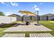Backyard patio with a fire pit and comfortable seating, ideal for outdoor gatherings at 1747 E Grove St, Phoenix, AZ 85040