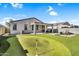 Spacious backyard featuring a green putting green, perfect for outdoor recreation and relaxation at 1747 E Grove St, Phoenix, AZ 85040