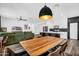 Spacious living area flows into a modern kitchen, features recessed lighting, and stylish decor at 1747 E Grove St, Phoenix, AZ 85040