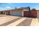 Charming single-story home with a well-maintained front yard and a two-car garage at 1802 W Isleta Ave, Mesa, AZ 85202