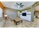 Cozy living room showcasing a modern entertainment center and comfortable seating at 18195 W Marshall Ln, Surprise, AZ 85388