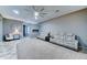Spacious living room featuring comfortable seating, a fireplace, and modern decor at 18195 W Marshall Ln, Surprise, AZ 85388