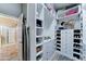 Spacious walk-in closet with built-in shelving and plenty of storage space at 18195 W Marshall Ln, Surprise, AZ 85388