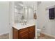 This bathroom offers a spacious vanity with ample countertop space at 18329 W Montebello Ave, Litchfield Park, AZ 85340