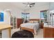 A bedroom offers natural light, with an inviting bed and ample storage, creating a serene retreat for rest and relaxation at 18329 W Montebello Ave, Litchfield Park, AZ 85340