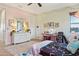 Bedroom featuring string lights, pastel walls, and plush carpet at 18329 W Montebello Ave, Litchfield Park, AZ 85340